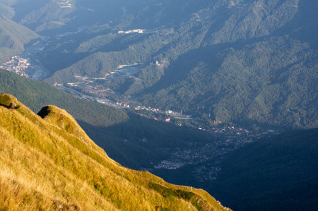Landscape view of the valley and the city in the mountains.
