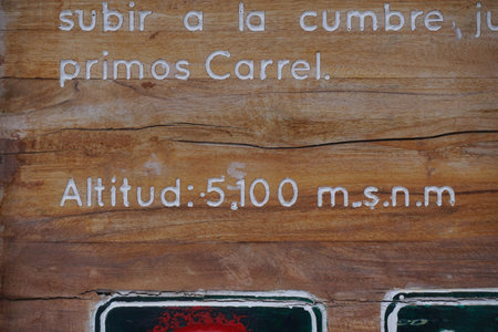 Wooden sign with information about volcanoの写真素材