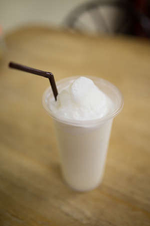 close up to a glass of blend fresh milkの写真素材