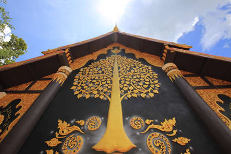 Thai mural painting behind the chapel of Wat Phra That Doi Phra Chan in Lampang, The north of Thailandの写真素材
