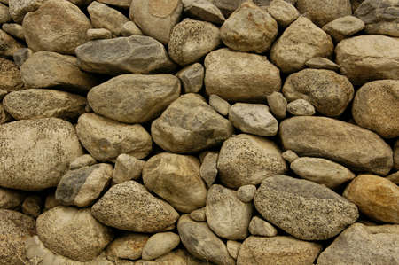 Close up of a rock wall with no binding cementの写真素材