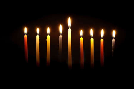 Chanuka candles lit for the eighth night.の写真素材