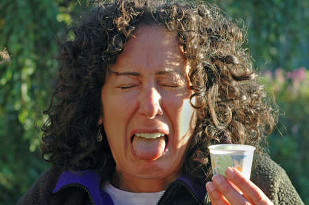 Woman tastes aweful medicine