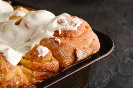 Sweet tasty homemade rose buns rolls with sugar whipped cream, hot and fresh, bakery for recipe book, angle viewの写真素材