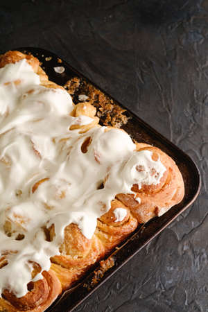Sweet tasty homemade rose buns rolls with sugar whipped cream, hot and fresh, bakery for recipe book, angle viewの写真素材