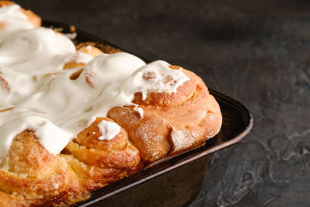 Sweet tasty homemade rose buns rolls with sugar whipped cream, hot and fresh, bakery for recipe book, angle viewの写真素材