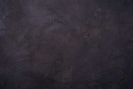 Cement dark black color textured background, stone concrete loft design wall
