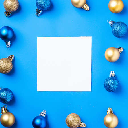 Christmas composition with white square copy space. Colorful ornament and baubles decorations....