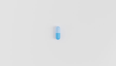 Capsule pill on white background, healthcare medical concept, antibiotics and cure, 3d renderの写真素材
