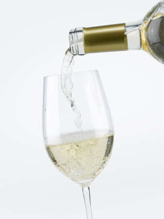 White Wine fillewd in a glassの写真素材