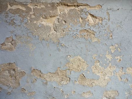 A grungy rough blue wall texture !の写真素材
