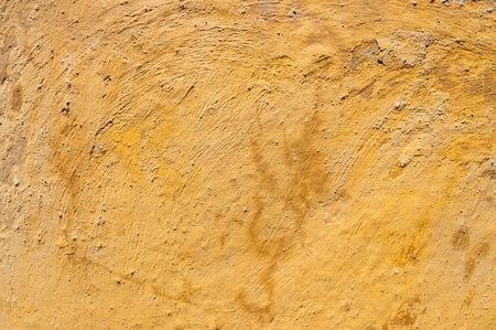 A grungy rough terracotta wall textureの写真素材