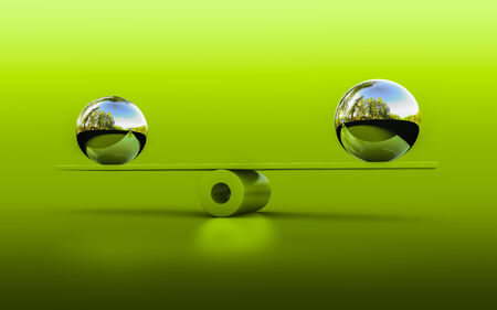 3d rendering of two spheres in balanceの写真素材