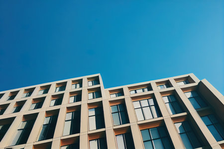 Low Angle View Of Building Against Clear Blue Sky. Abstract architecture, fragment of modern urban geometry. digital illustration.の写真素材