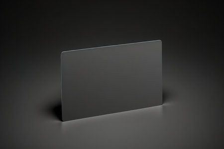 Blank black card isolated on black background with shadow minimal conceptual 3D renderingの写真素材