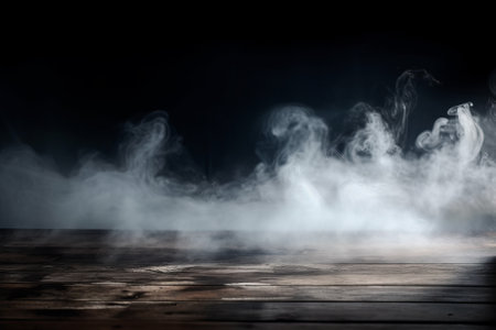 Abstract defocused smoke on a wooden table in a dark foggy atmosphere.の写真素材