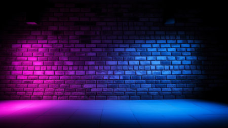 Glowing neon lights in shades of pink, purple, and blue illuminate a black brick wall, creating a dramatic effect in the dark.の写真素材
