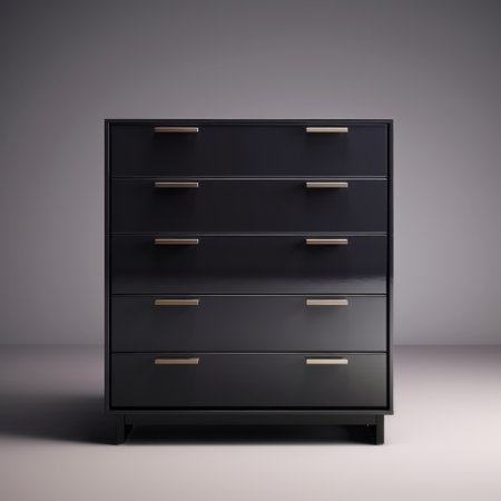 a black dresser with silver handles.の素材
