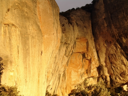 A rock climber is on a cliff in Montsarraの写真素材