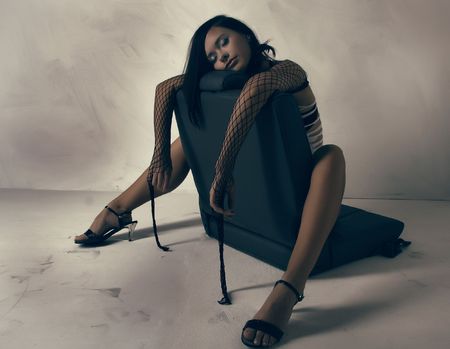 The sexual girl sleep in an armchair from carの写真素材