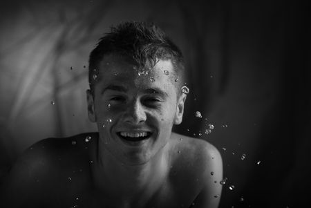 glamour portrait of the man on jets of water.
の写真素材