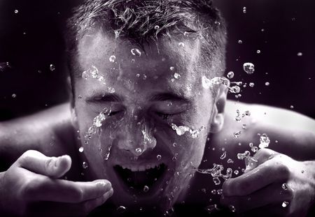 glamour portrait of the man on jets of water.
の写真素材