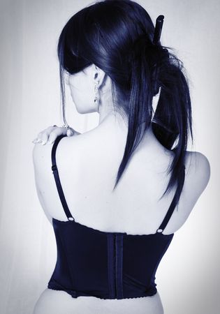 Beautiful young girl dressed in lingerieの写真素材