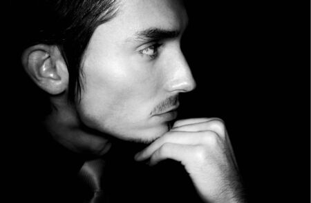  Closeup portrait of sensual man with beautiful face and eyes