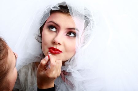 Stylist at work. Young attractive girl in dressの写真素材