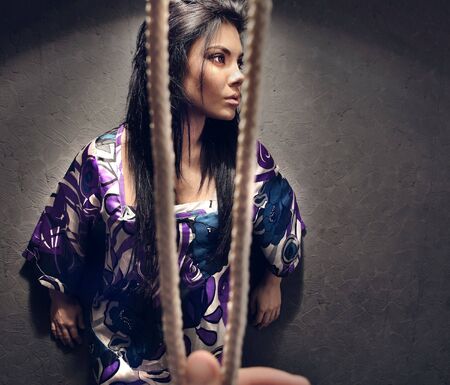 Young attractive girl in front of cords