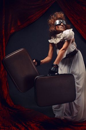 Young girl in futuristic sun glasses with unusual makeupの写真素材