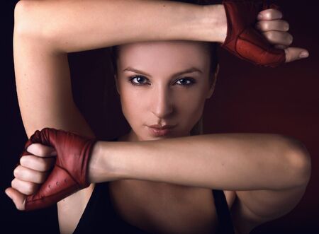 Attractive posing blonde in a red sport gloves.
の写真素材