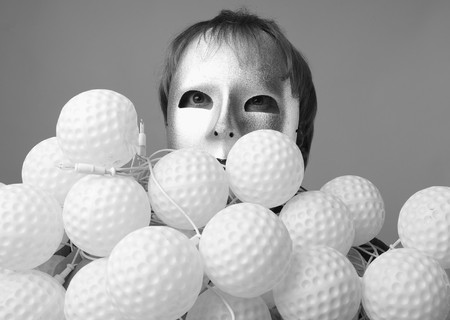 man in a silver mask with a sheaf of nock bolの写真素材
