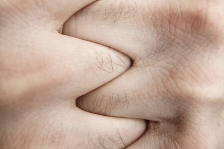 Male hands Combined together. Macro close-up.の写真素材