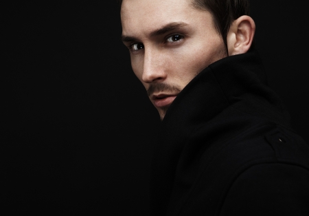 Young man's portrait. Close-up face.の写真素材