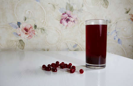 Fresh cowberry and berry juice glassの写真素材