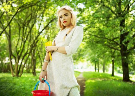 The blonde in park  Outdoor photo  の写真素材