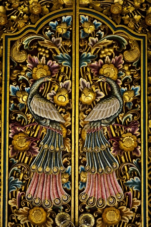 Old wooden door with ornaments の写真素材