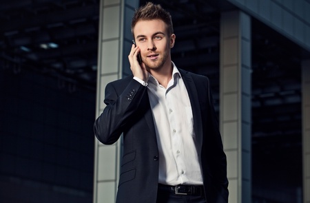 Portrait of a cheerful young businessman の写真素材