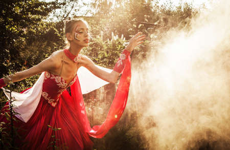 Attractive romantic woman on beautiful dress pose outdoor  Autumn  の写真素材