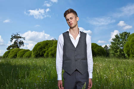 Good looking beautiful young man outdoor  の写真素材