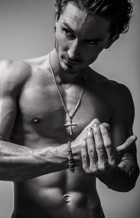 Beautiful and health athletic caucasian muscular young man  Black-white photo  の写真素材