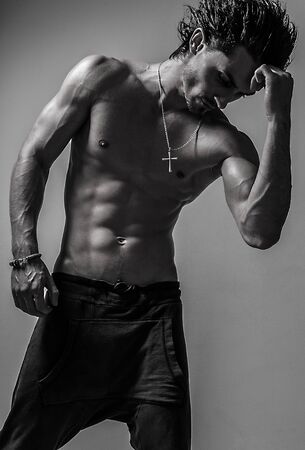 Beautiful and health athletic caucasian muscular young man  Black-white photo  の写真素材