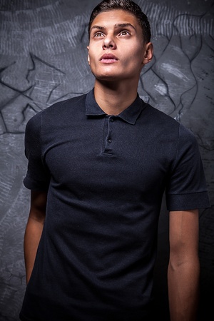 Elegant young handsome man  Studio fashion portrait  の写真素材