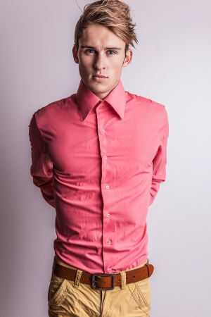 Elegant young handsome man  Studio fashion portrait  の写真素材