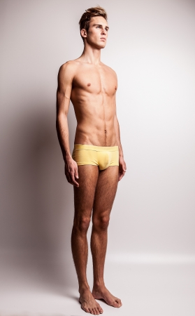 Elegant young handsome man  Studio fashion portrait  の写真素材