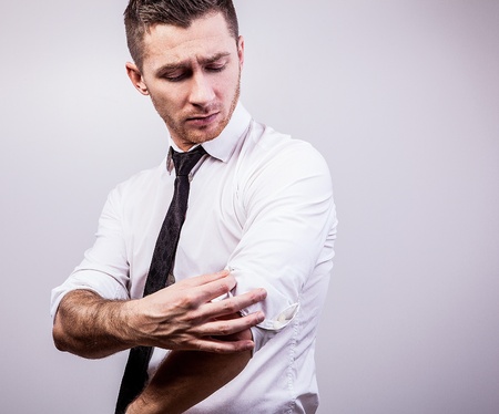 Elegant young handsome man  Studio fashion portrait  の写真素材