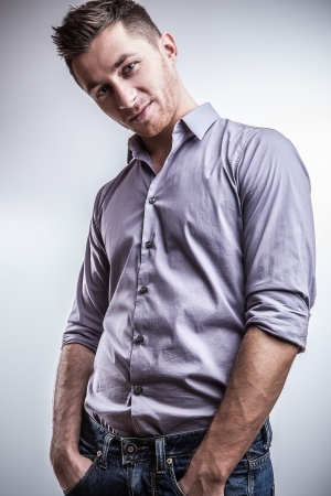 Elegant young handsome man  Studio fashion portrait  の写真素材