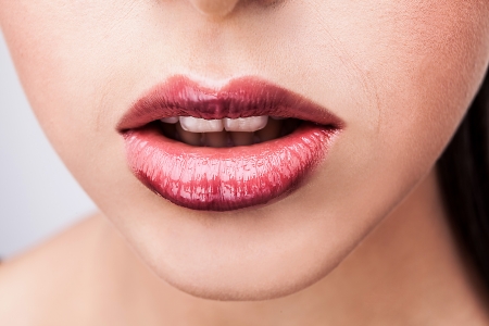Close-up face of beauty young woman lips  の写真素材