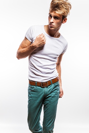 Elegant young handsome man  Studio fashion portrait  の写真素材